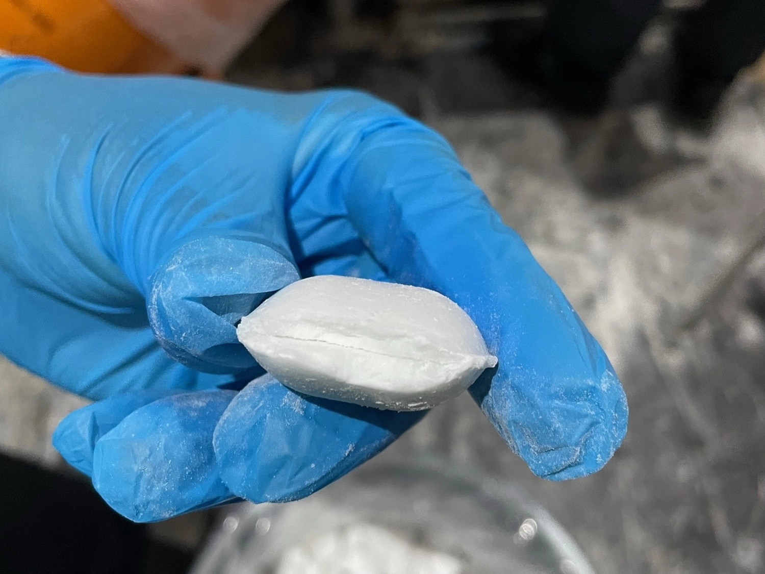 Cyanide Technology Consulting GmbH - production, engineering, and operation of cyanide plants (NaCN & HCN) - the image appears to be a pressed form of a powdered substance, often associated with seized illicit materials like cocaine or methamphetamine.